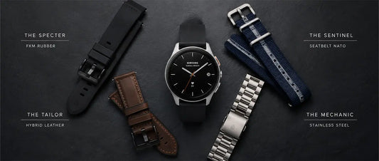 Samsung Galaxy Watch 6 bands compared — FKM rubber, NATO, leather, and stainless steel strap options laid flat beside Galaxy Watch