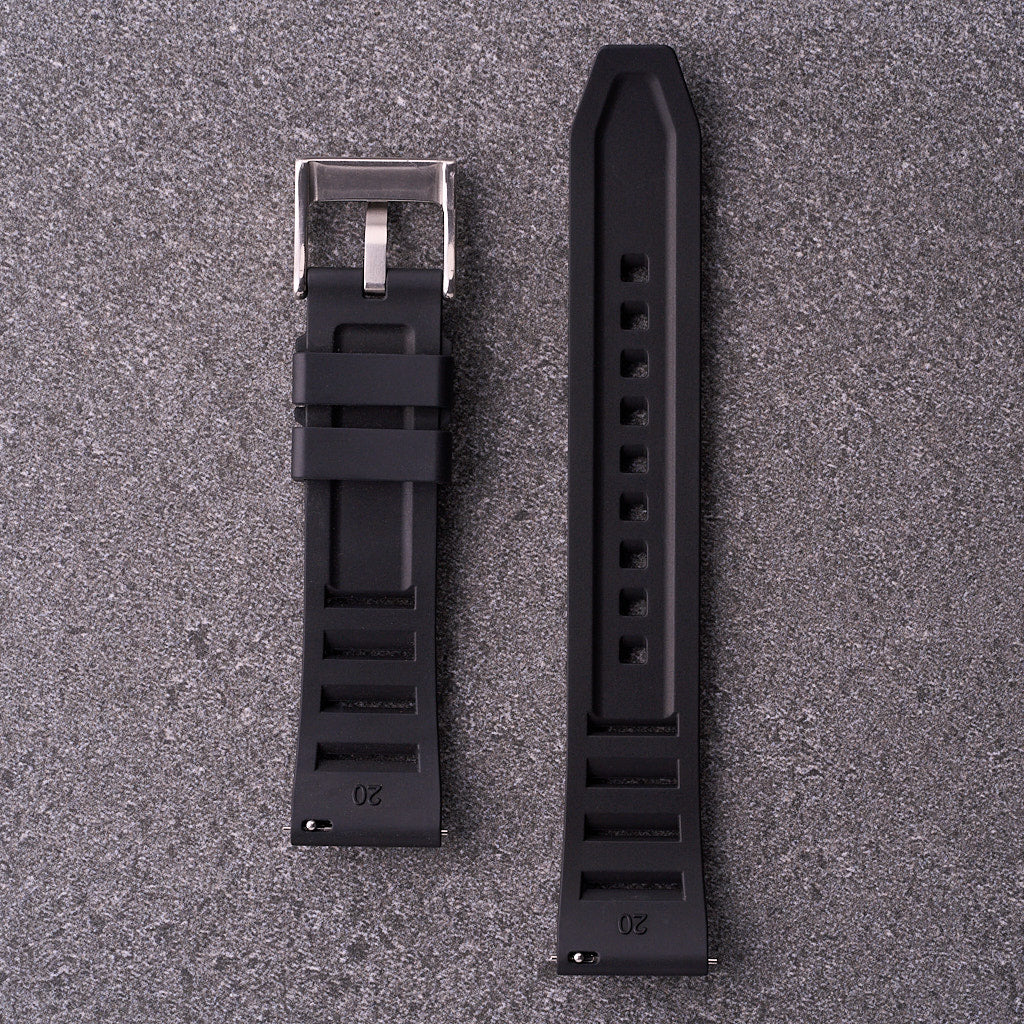 Underside of The Bastion black FKM rubber strap showing laddered vents and buckle, fits 20mm 22mm and 24mm watch lugs.