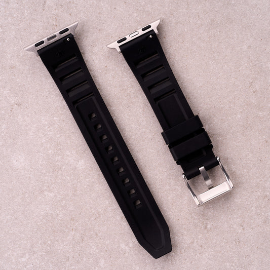 The Bastion FKM rubber Apple Watch band in Black, back view showing the quick release pin and strap size marking