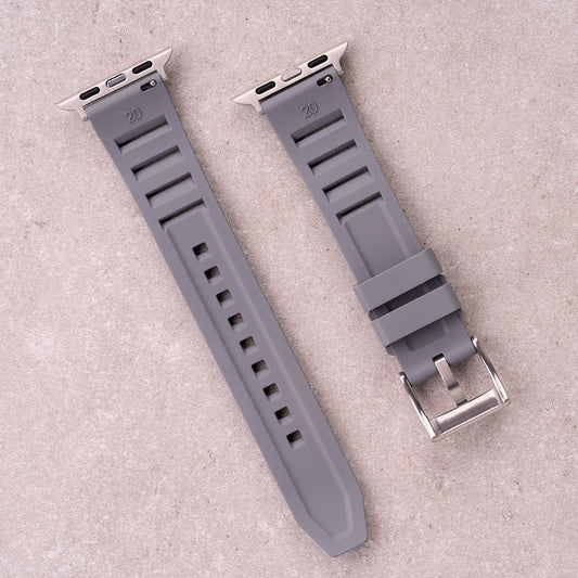 The Bastion FKM rubber Apple Watch band in Grey, back view showing the quick release pin and strap size marking