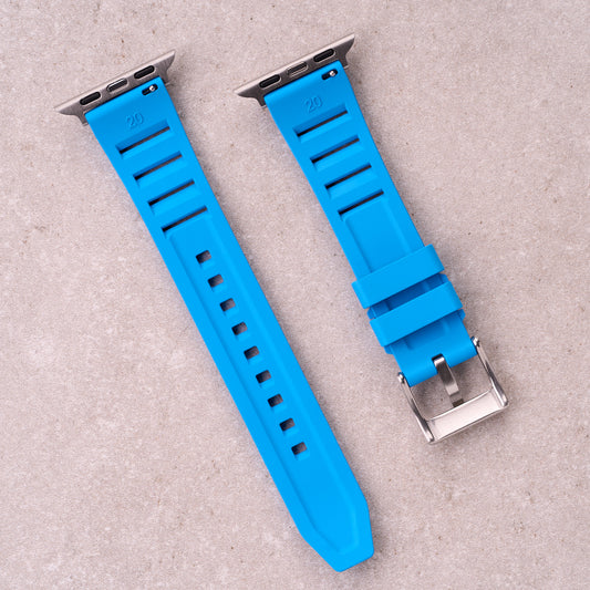 The Bastion FKM rubber Apple Watch band in Light Blue, back view showing the quick release pin and strap size marking