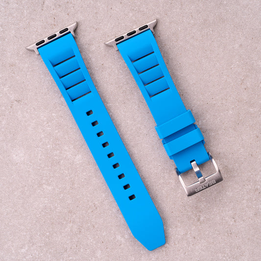 The Bastion FKM rubber Apple Watch band in Light Blue, front view showing the full strap and buckle