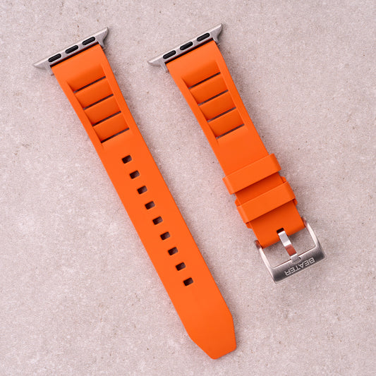 The Bastion FKM rubber Apple Watch band in Orange, front view showing the full strap and buckle