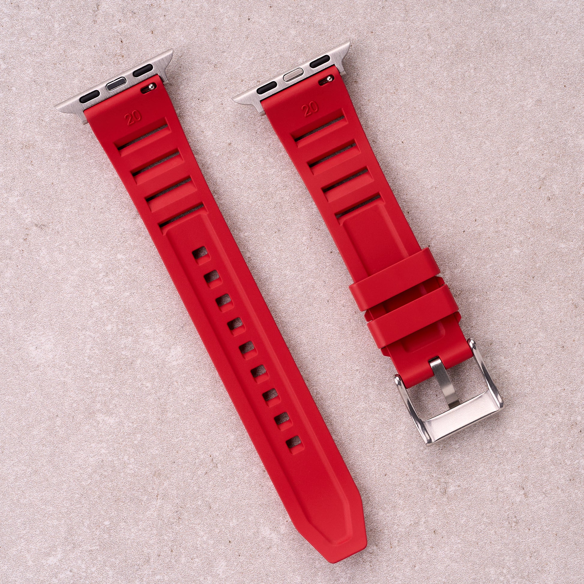 The Bastion FKM rubber Apple Watch band in Red, back view showing the quick release pin and strap size marking
