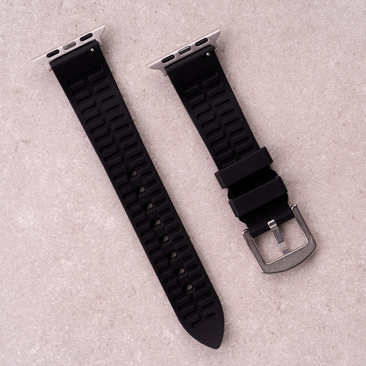 The Callaway FKM rubber Apple Watch band in Black, back view showing the quick release pin and strap size marking