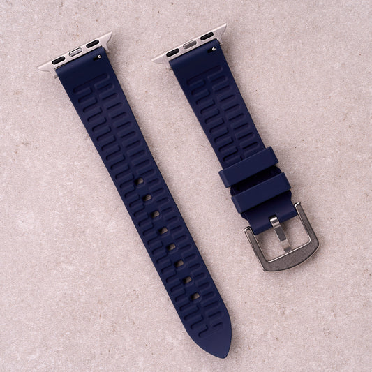 The Callaway FKM rubber Apple Watch band in Navy Blue, back view showing the quick release pin and strap size marking