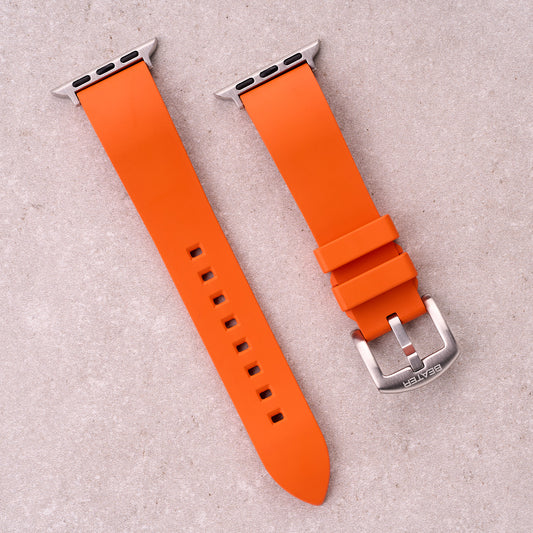 The Callaway FKM rubber Apple Watch band in Orange, front view showing the full strap and buckle