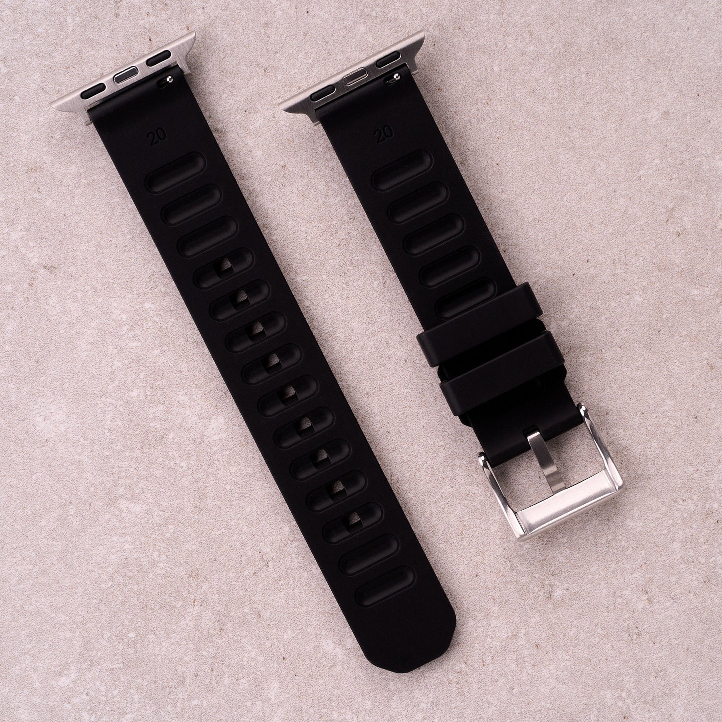 The Gatton FKM rubber Apple Watch band in Black, back view showing the quick release pin and strap size marking