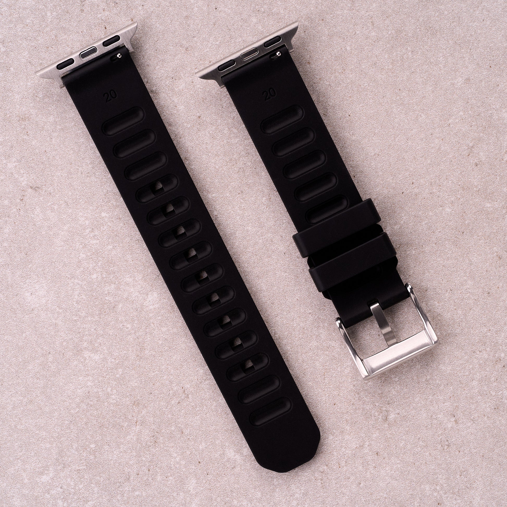 The Gatton FKM rubber Apple Watch band in Black, back view showing the quick release pin and strap size marking