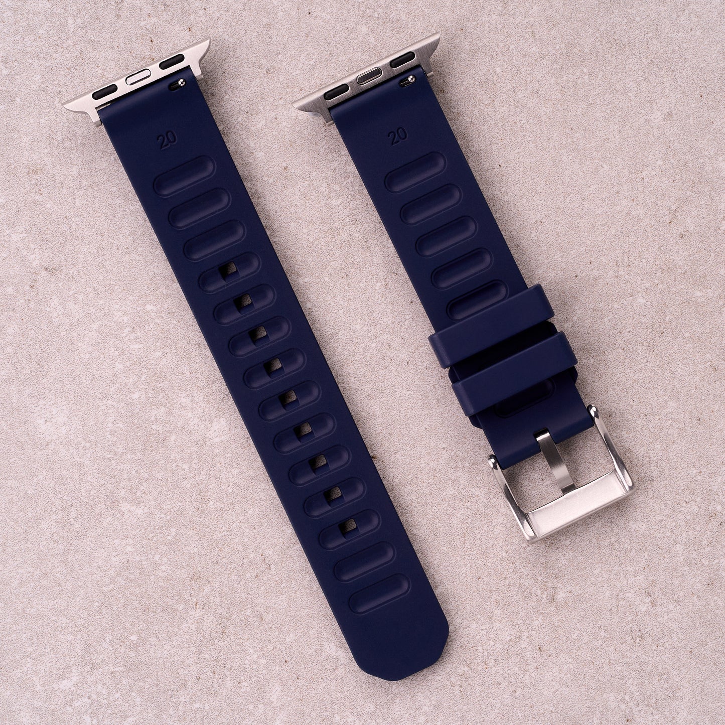 The Gatton FKM rubber Apple Watch band in Navy Blue, back view showing the quick release pin and strap size marking