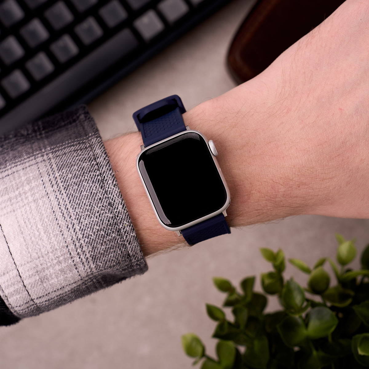 The Gatton FKM rubber Apple Watch band in Navy Blue worn on the wrist with an Apple Watch