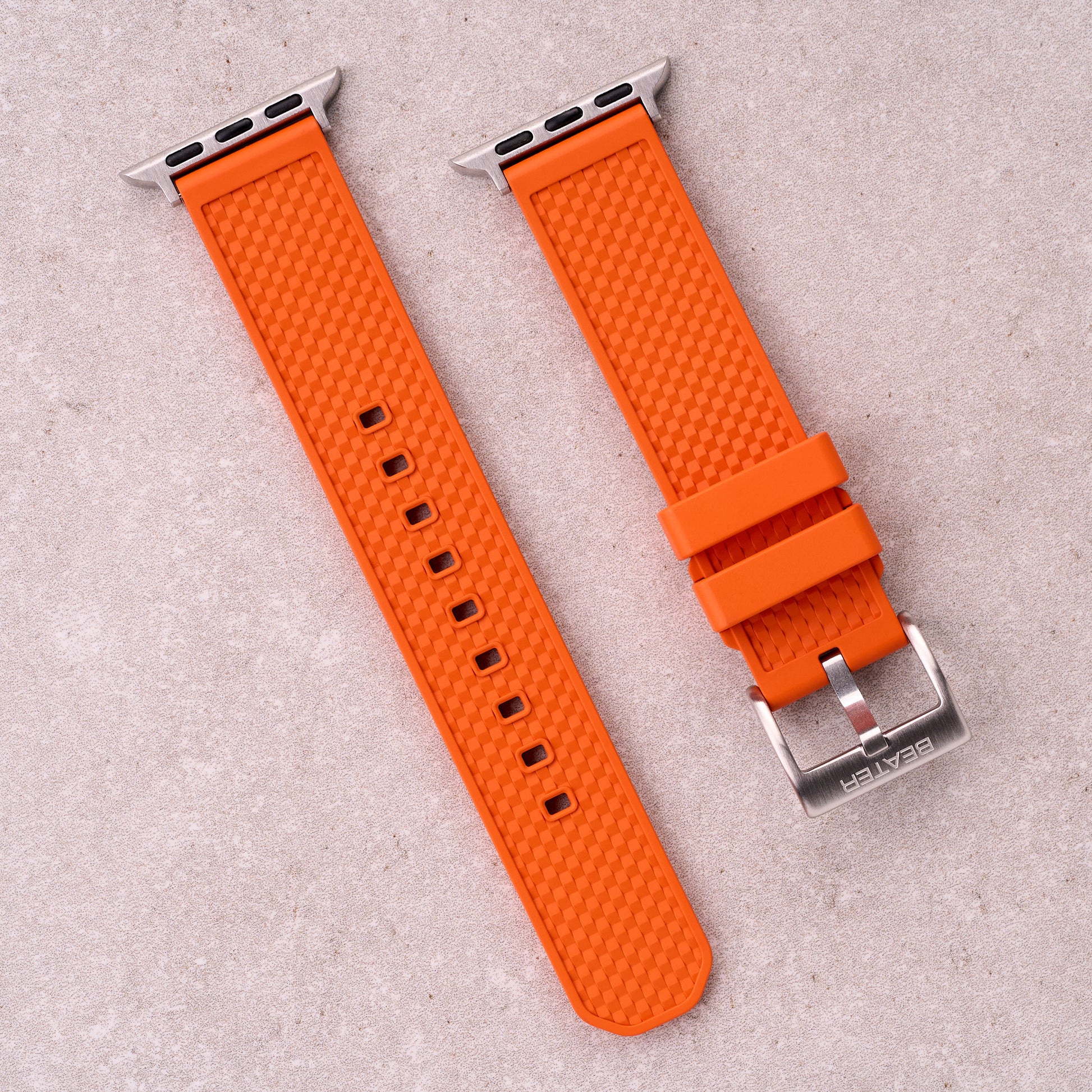 The Gatton FKM rubber Apple Watch band in Orange, front view showing the full strap and buckle