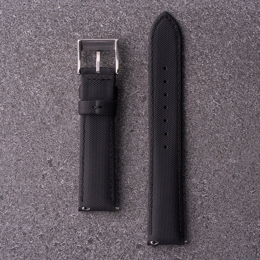 Underside of The Harbour black strap showing smooth backing and buckle hardware.