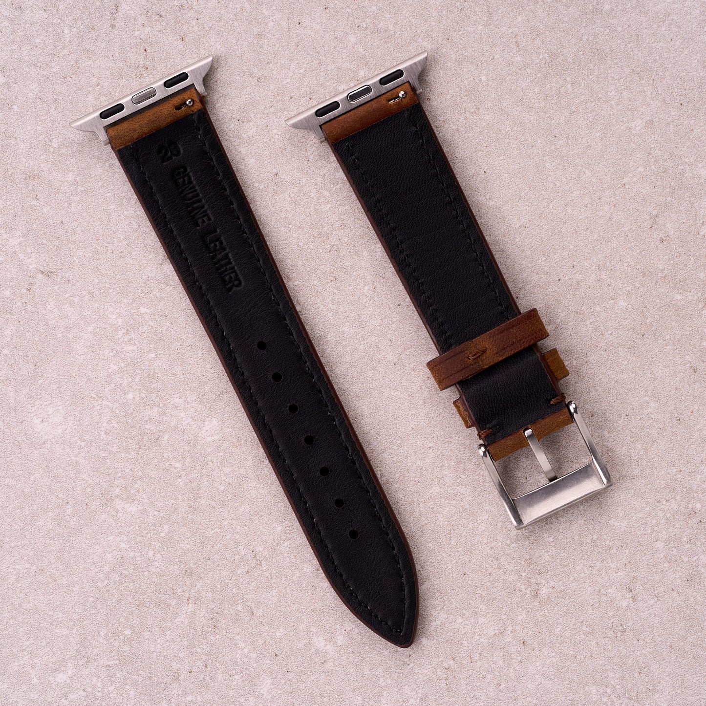 The Harrington leather Apple Watch band in Brown, back view showing the quick release pin and strap size marking