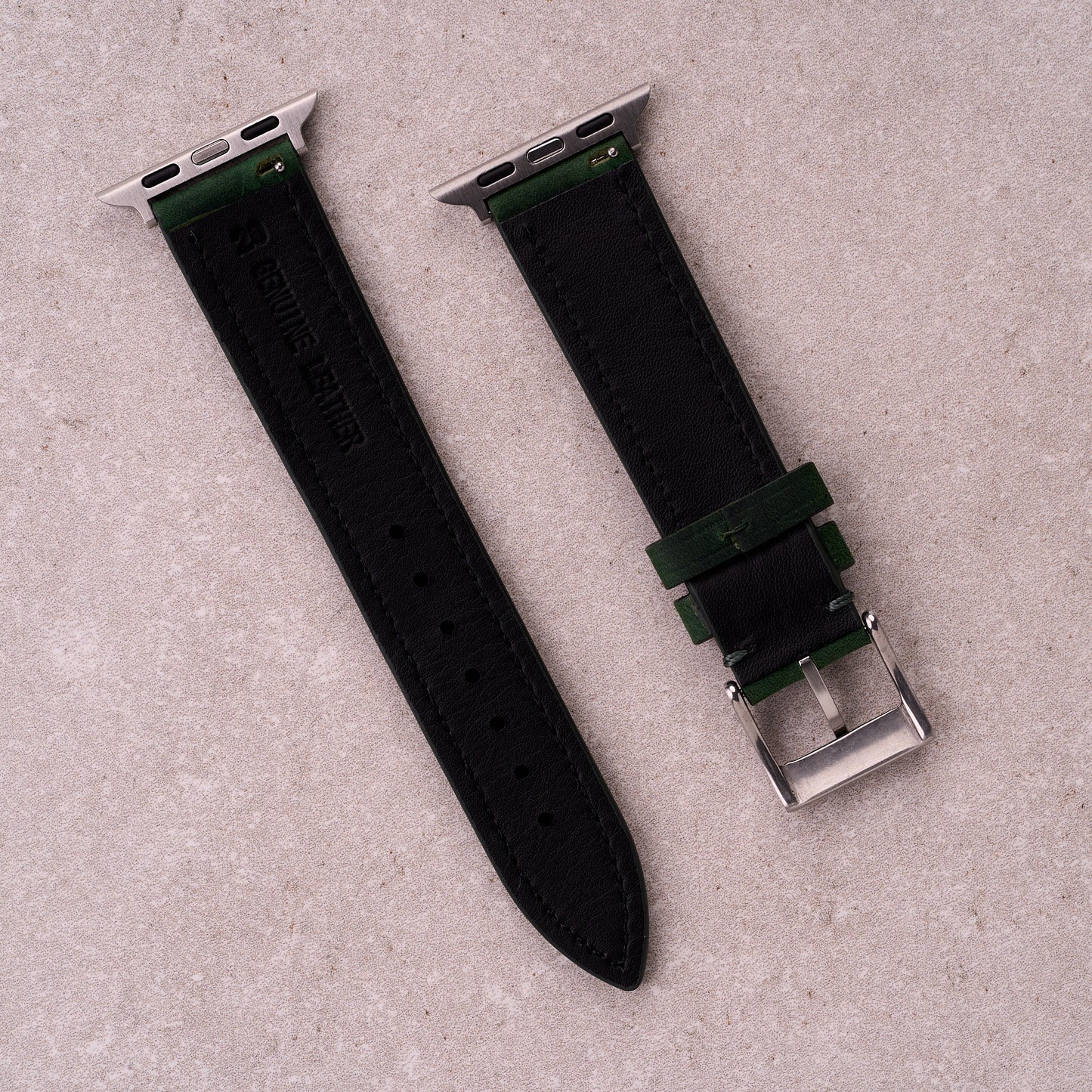 The Harrington leather Apple Watch band in Forest Green, back view showing the quick release pin and strap size marking