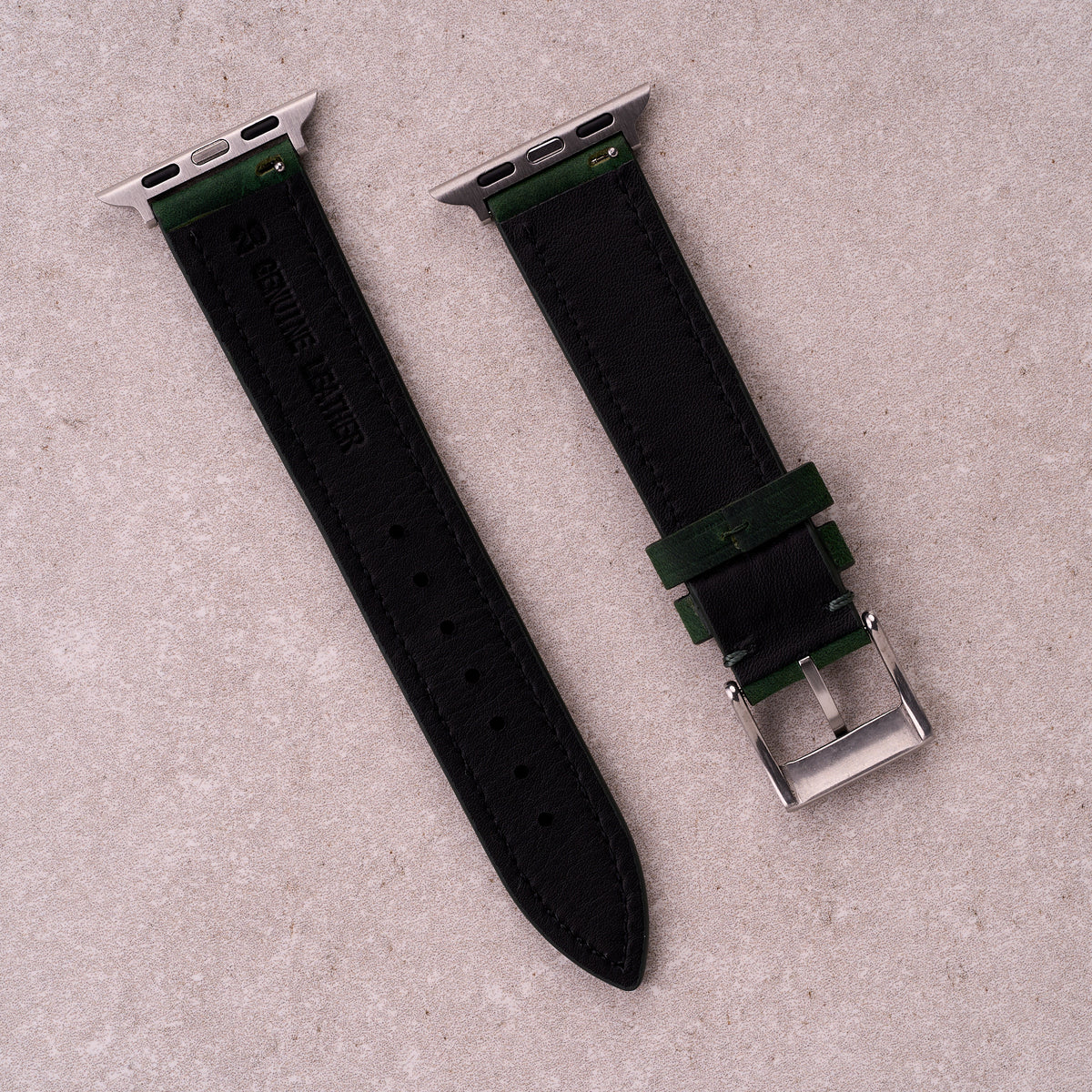 The Harrington leather Apple Watch band in Forest Green, back view showing the quick release pin and strap size marking