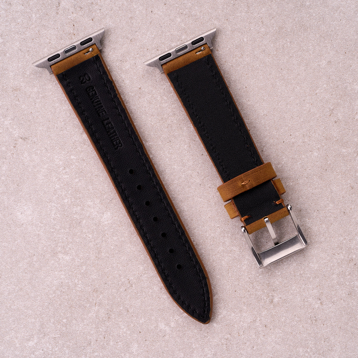 The Harrington leather Apple Watch band in Light Brown, back view showing the quick release pin and strap size marking