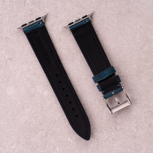 The Harrington leather Apple Watch band in Navy Blue, back view showing the quick release pin and strap size marking