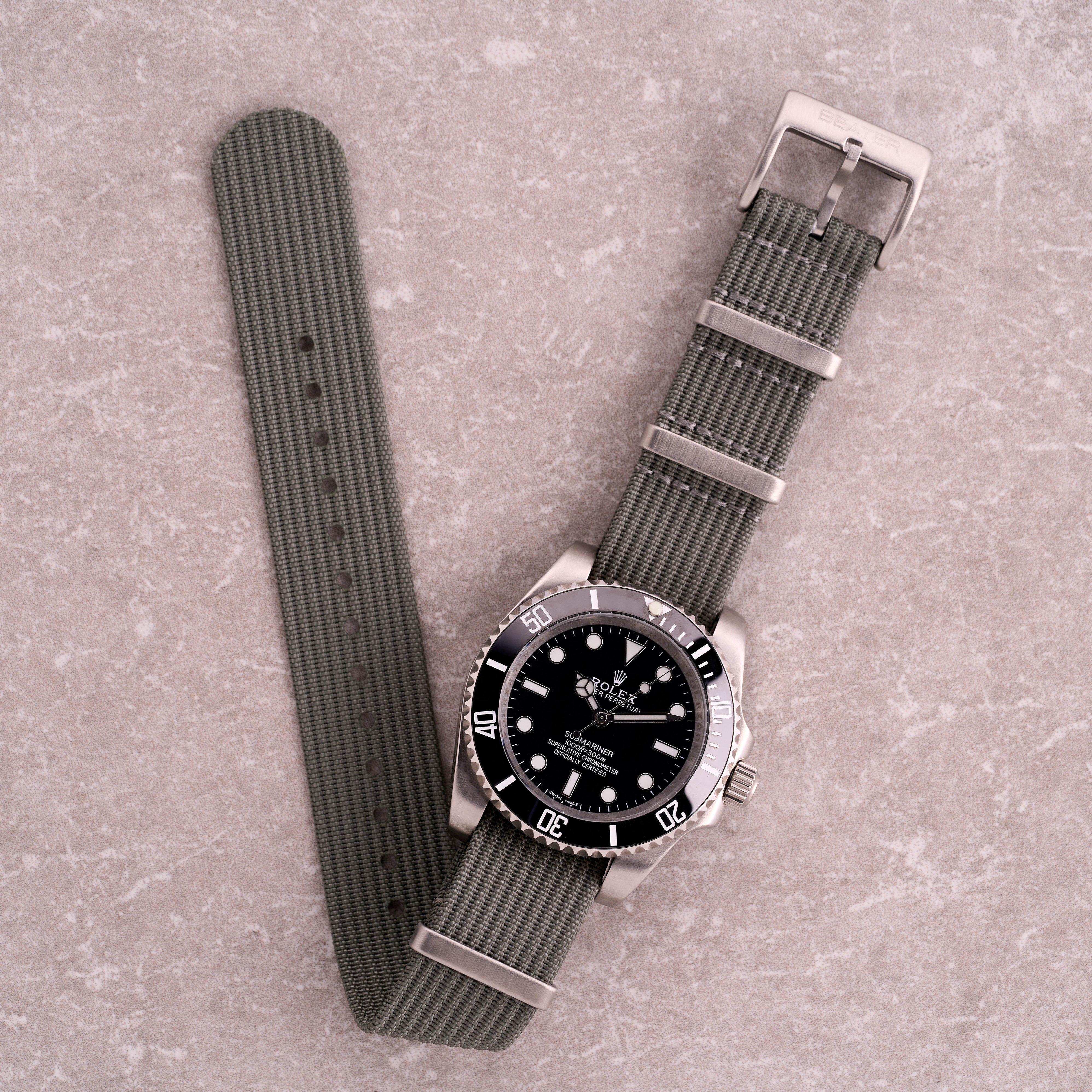The Operator light grey corrugated NATO strap, slim nylon watch strap with corrugated texture and stainless hardware for daily wear.