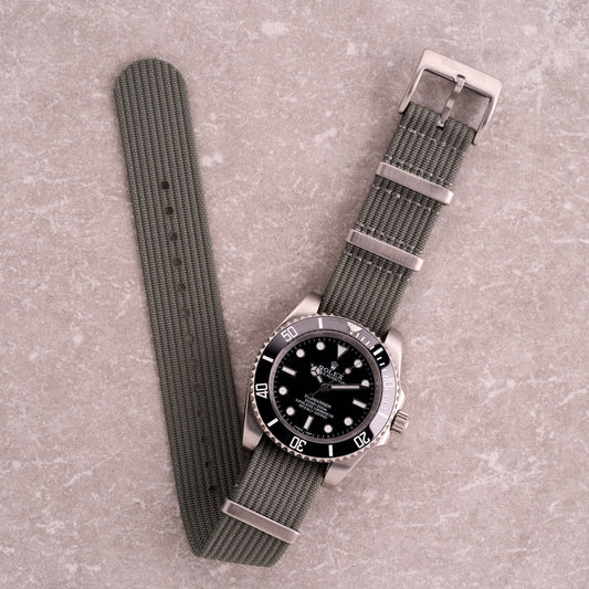 The Operator light grey corrugated NATO strap, slim nylon watch strap with corrugated texture and stainless hardware for daily wear.