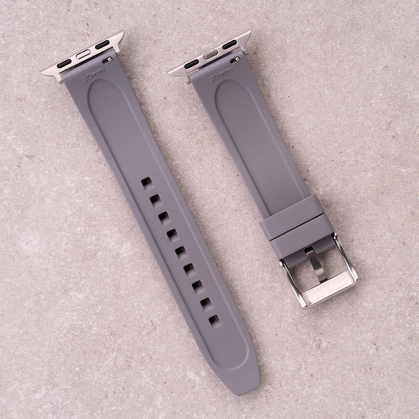 The Specter FKM rubber Apple Watch band in Grey, back view showing the quick release pin and strap size marking