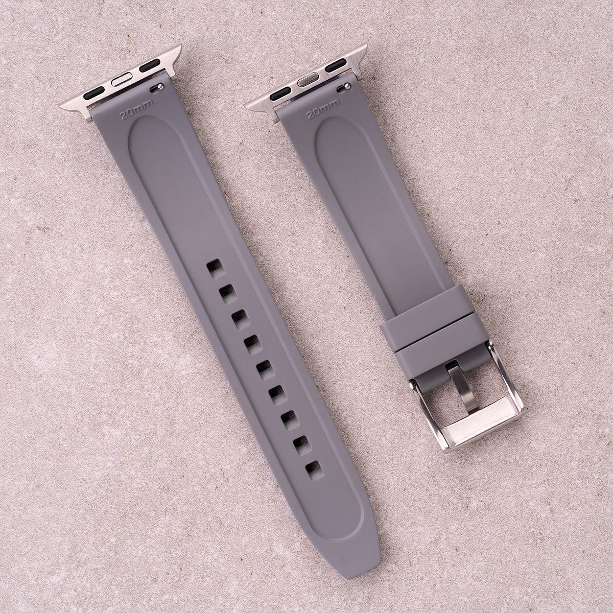 The Specter FKM rubber Apple Watch band in Grey, back view showing the quick release pin and strap size marking