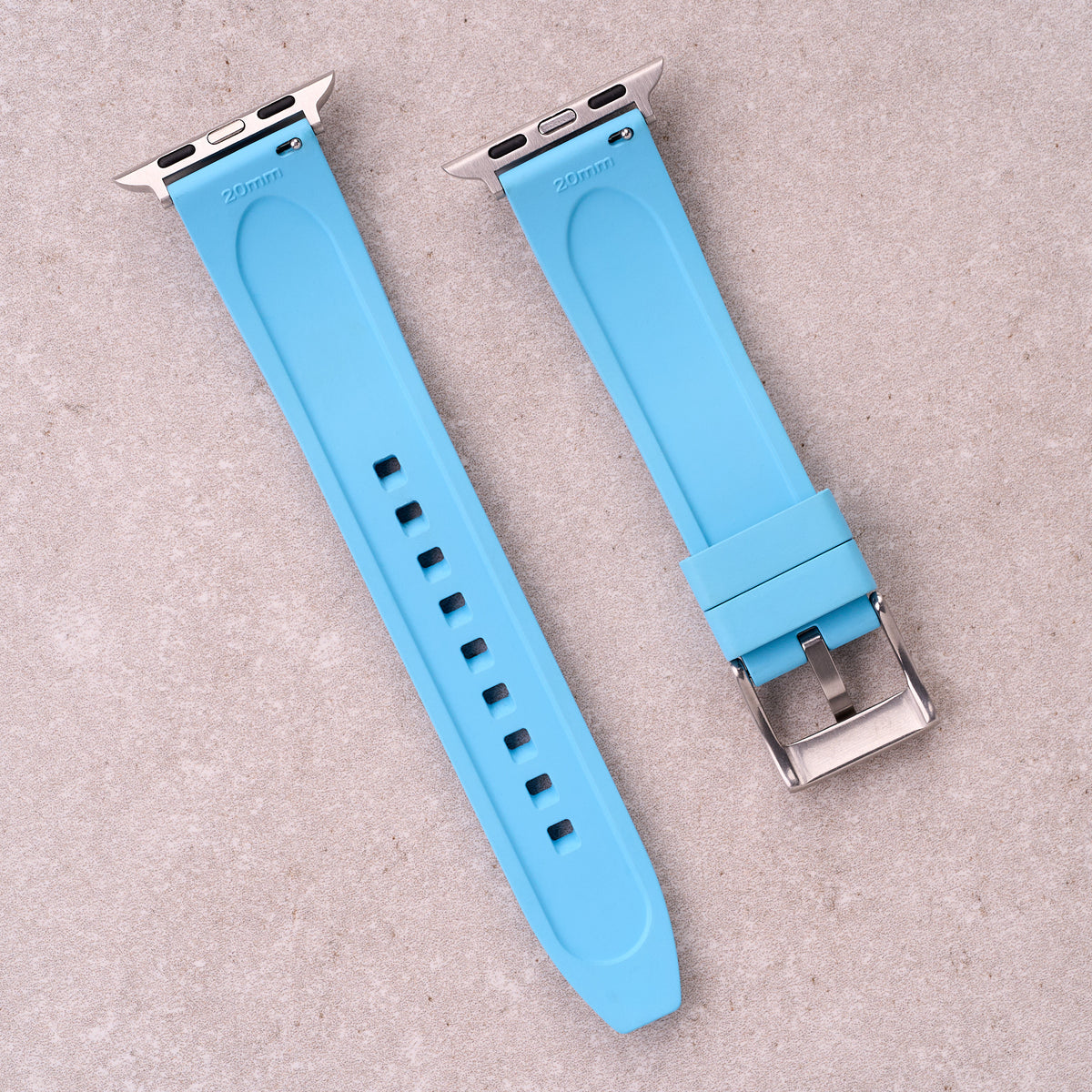 The Specter FKM rubber Apple Watch band in Light Blue, back view showing the quick release pin and strap size marking