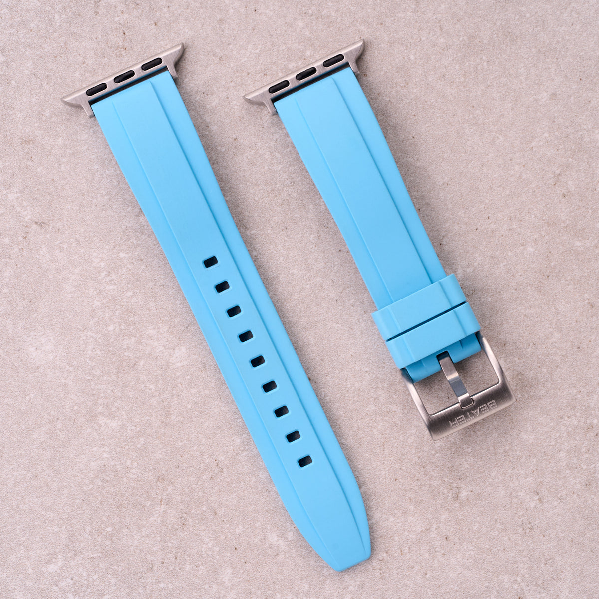 The Specter FKM rubber Apple Watch band in Light Blue, front view showing the full strap and buckle