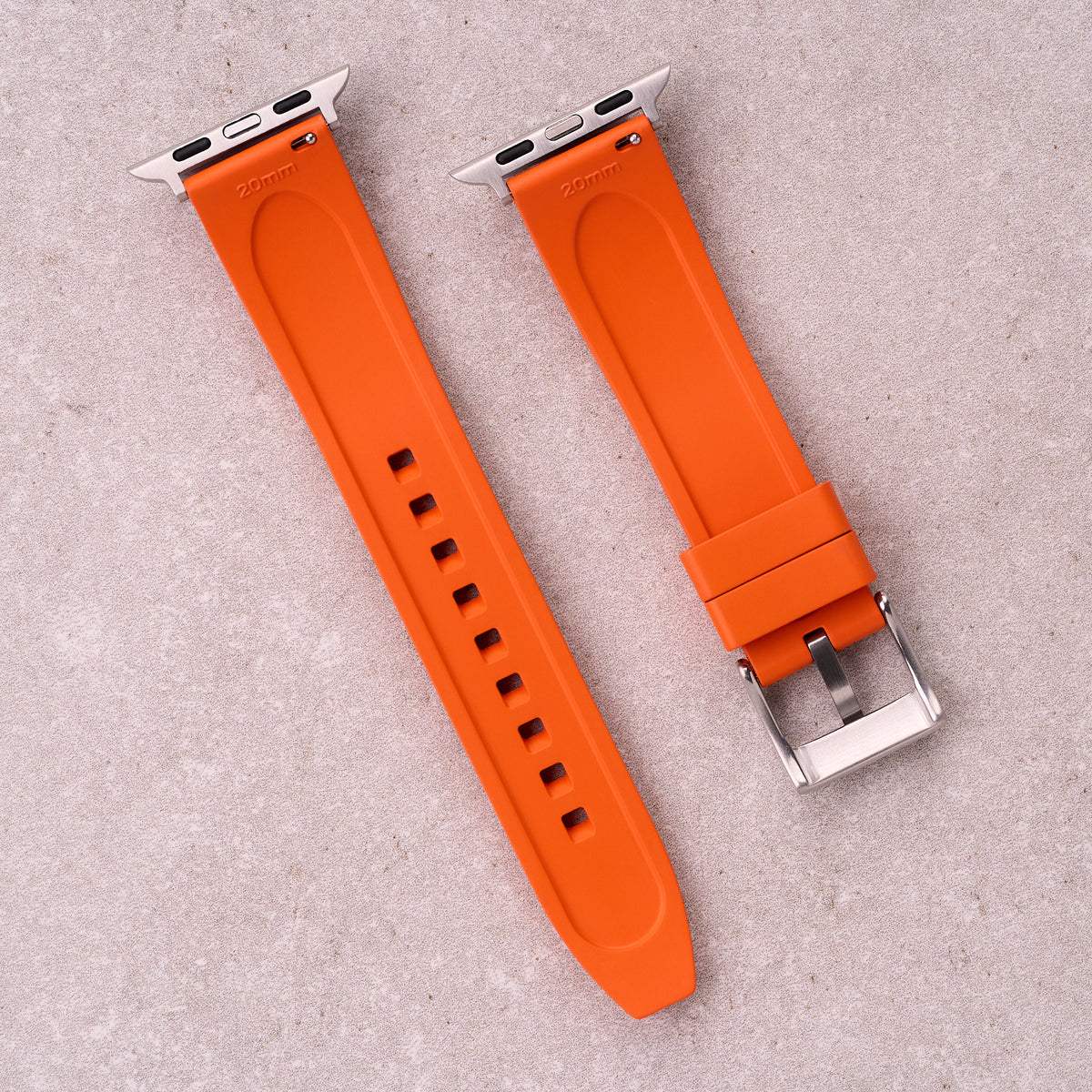 The Specter FKM rubber Apple Watch band in Orange, back view showing the quick release pin and strap size marking