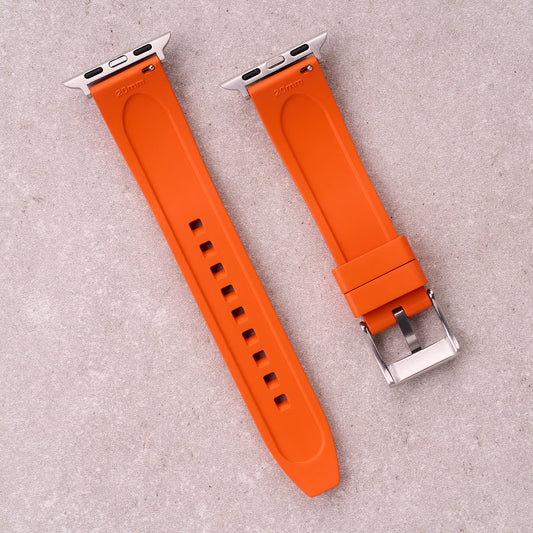 The Specter FKM rubber Apple Watch band in Orange, back view showing the quick release pin and strap size marking