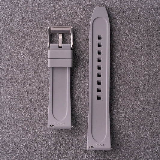 Underside of The Specter grey strap showing lightly textured rubber and steel buckle.
