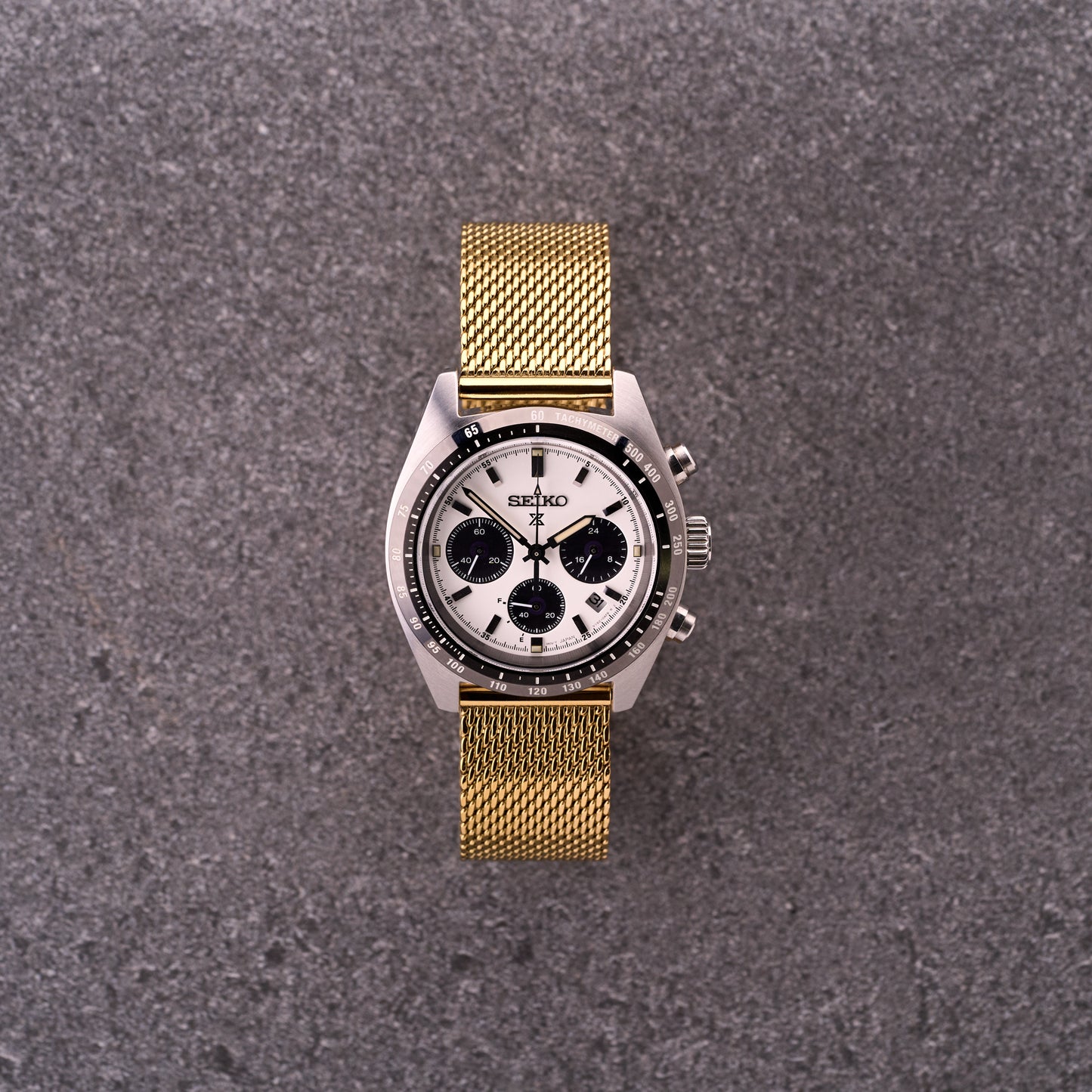 Gold The Sterling mesh stainless steel watch bracelet on a dress watch, warm gold Milanese mesh band for classic watches.​