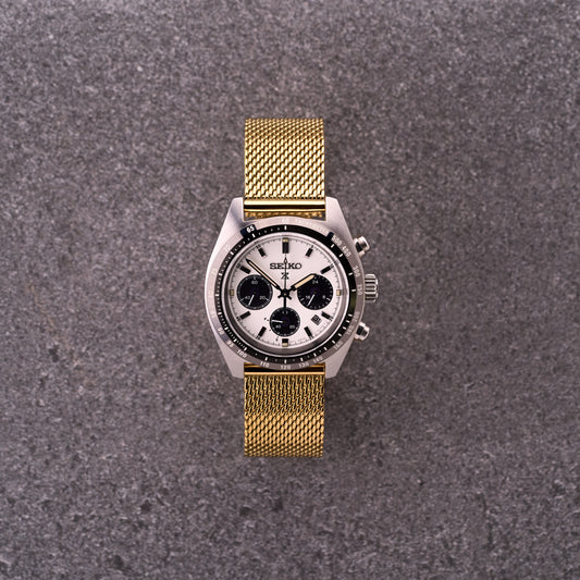 Gold The Sterling mesh stainless steel watch bracelet on a dress watch, warm gold Milanese mesh band for classic watches.​