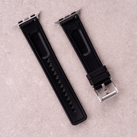 The Tailor leather and FKM rubber Apple Watch band in Black, back view showing the quick release pin and strap size marking