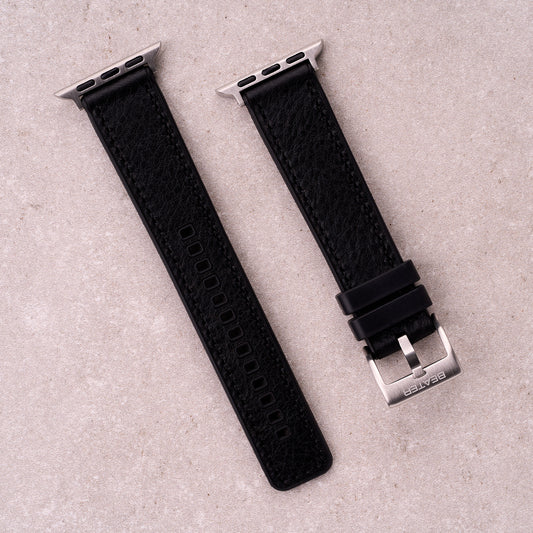The Tailor leather and FKM rubber Apple Watch band in Black, front view showing the full strap and buckle