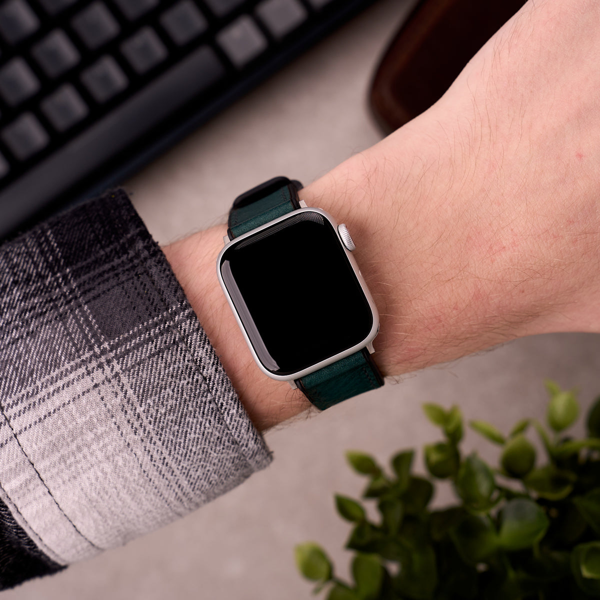 The Tailor leather and FKM rubber Apple Watch band in Blue worn on the wrist with an Apple Watch