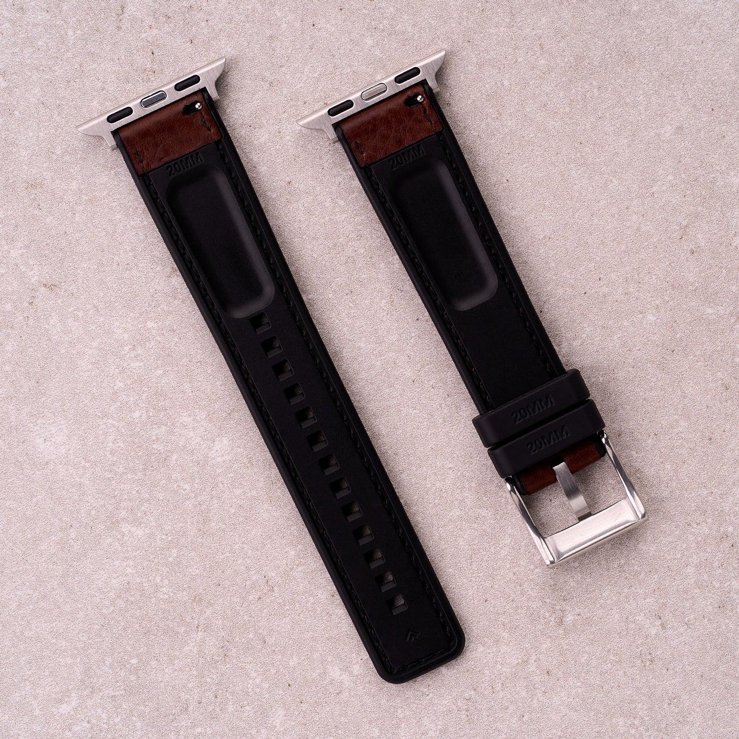 The Tailor leather and FKM rubber Apple Watch band in Brown, back view showing the quick release pin and strap size marking